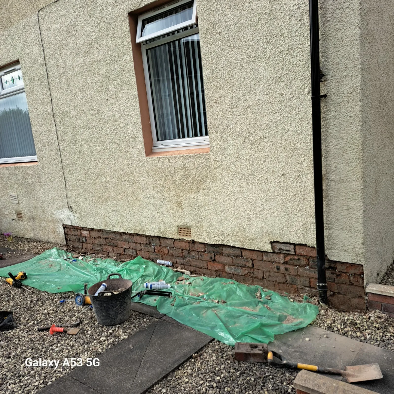 Brickwork exposed during external damp remedial work
